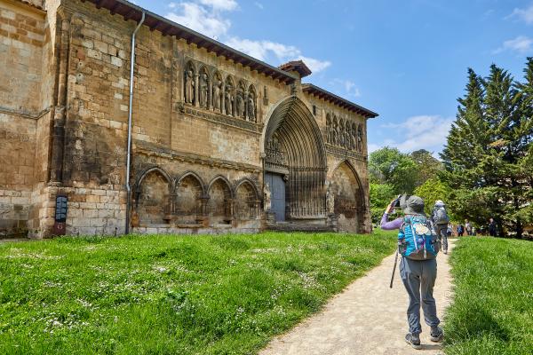 Pilgrim taking a picture of Santa María Jus del Castillo